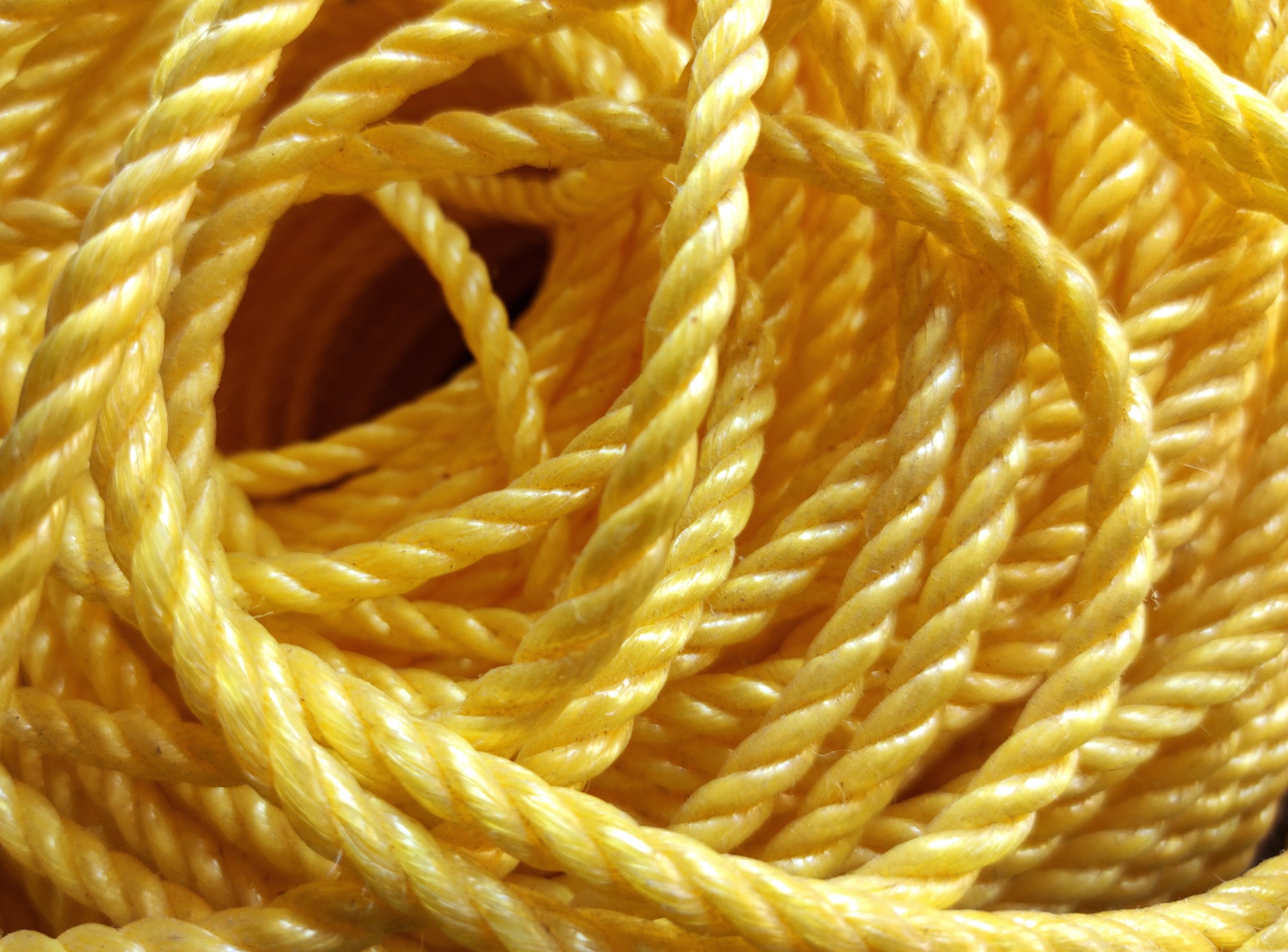 Yellow nylon rope for water skiing, but kids used it for rock climbing.