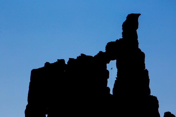 burr110513_221 Rappel Silhouette Moab Utah Desert Tower Rock cLimbing