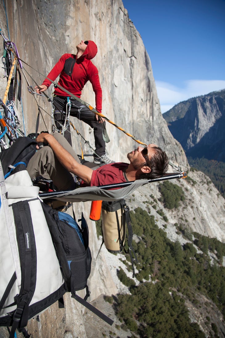 Lifestyle_Tommy_Kevin_(c)JoshLowell Tommy Caldwell and Kevin Jorgeson on a portaledge looking up at the wall.