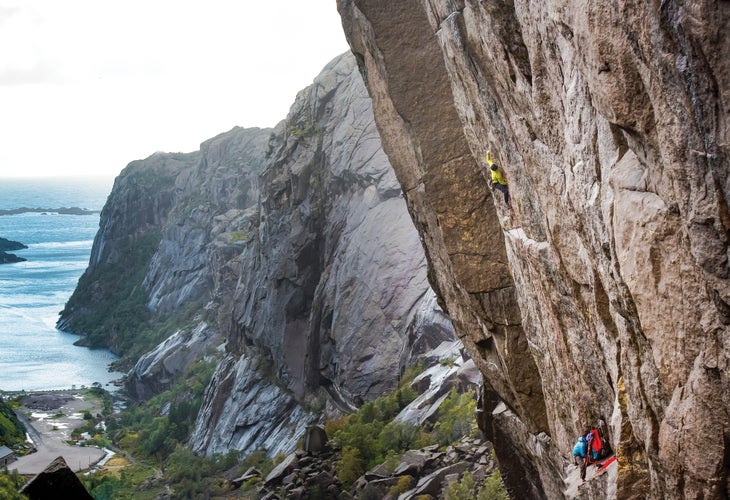 TristanHobson_6372_gn-web Two men climbing a cliff by the coast