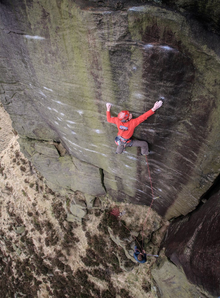 _MG_3928_Ravenstones_E8 a man running it out way above a single low piece on an unprotectable gritstone wall
