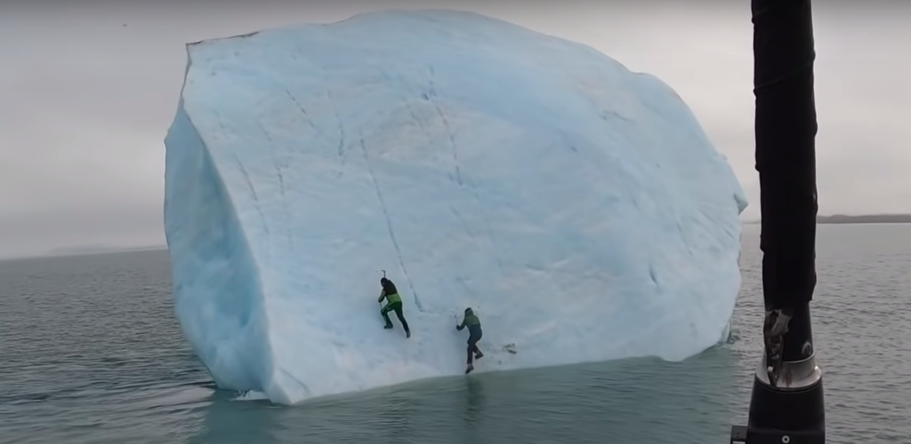 Video Iceberg Rolls With Ice Climbers on It