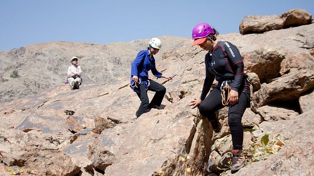 Women climbing near Tehran, Iran, in 2014.
