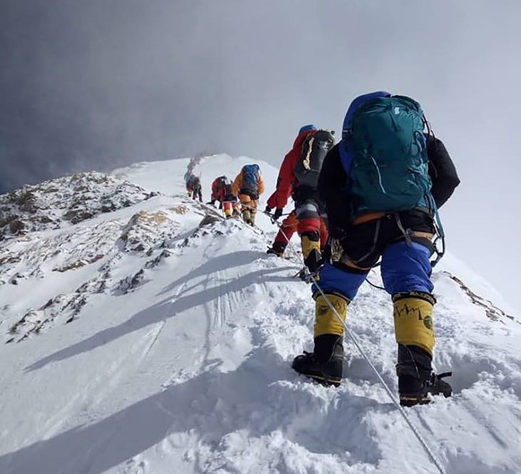 In this photo taken on May 16, 2018, mountaineers ascend on their way to the summit of Mount Everest, as they climb on the south face from Nepal.