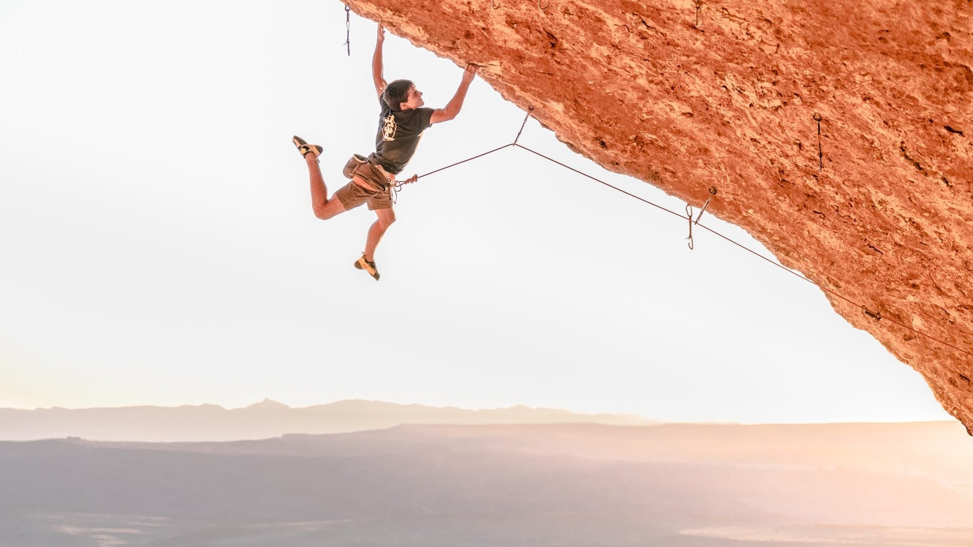 Connor Herson on 5.14 #48: Peregrination (5.14b), March 2021.