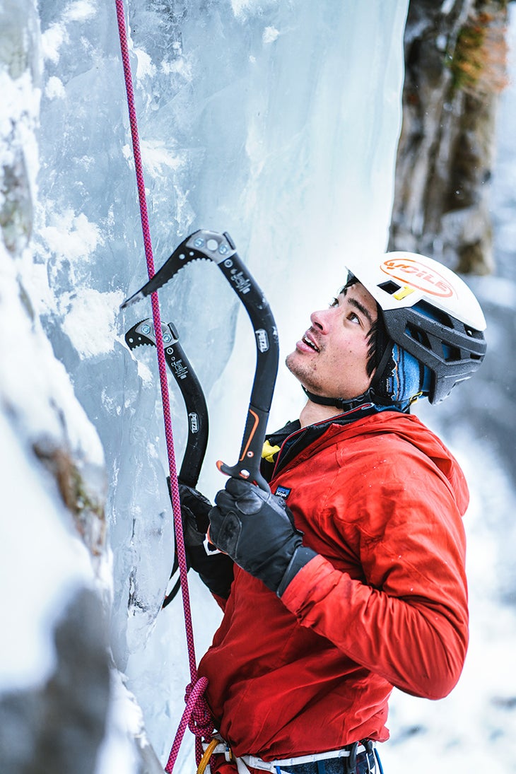 Matt Zia, a guide from the Montana Mountaineering Association, delicately taps his way up a piece of ice. 