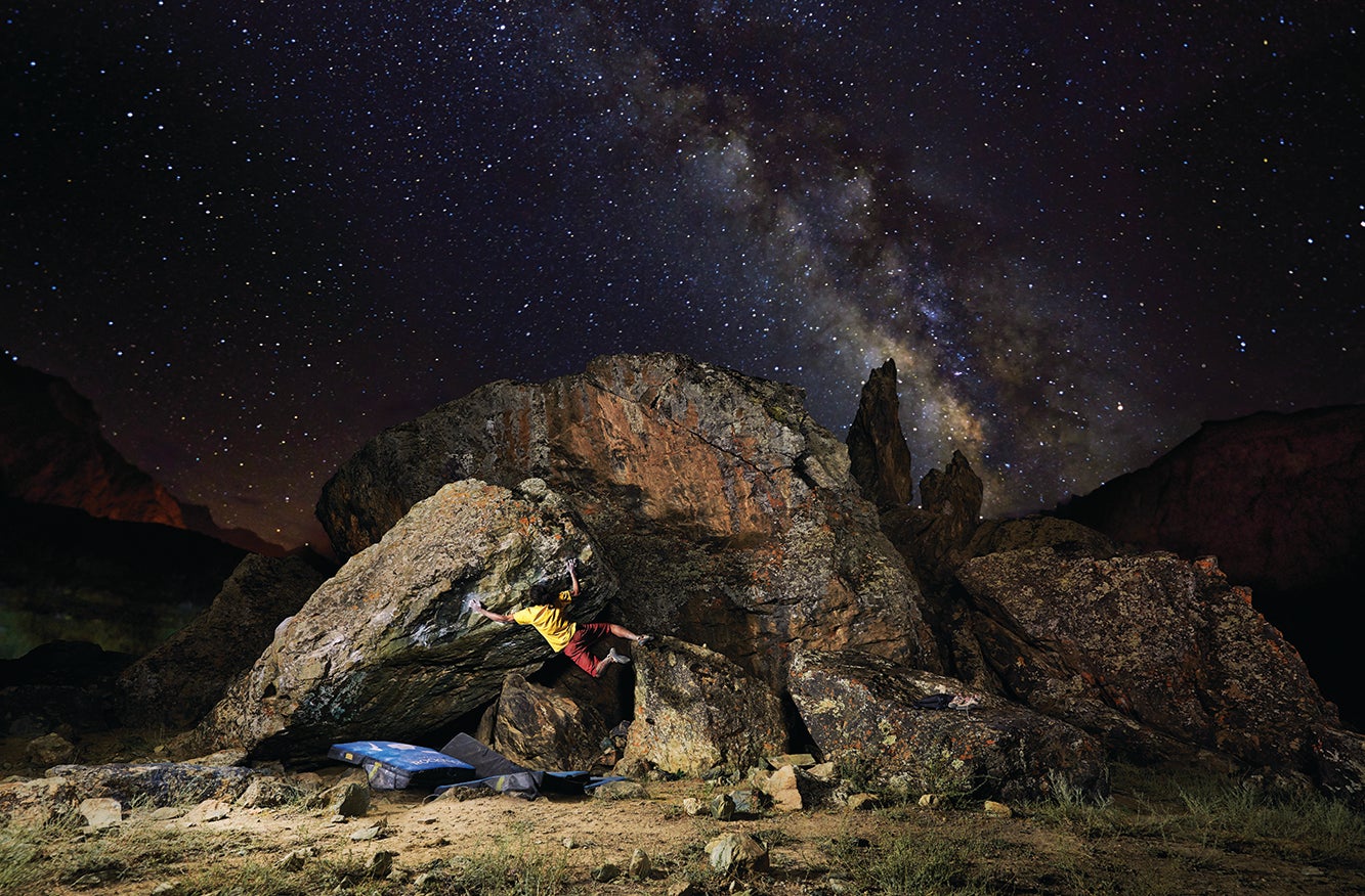 Sandeep Maity busts a move on Green Mamba (V9), Quantum Sector, with the Milky Way as a witness. Maity is an Indian national climbing champion and works as a freelance climbing instructor. A climber of 10 years, he has opened more than 500 boulders across India.
Photo by Sharad Chandra