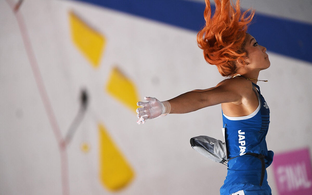 Miho Nokona of Japan, airborne on the Boulder finals during the Sport Climbing event at the 2020 Olympics. She would place third in Boulder, and would go on to take the Silver medal.