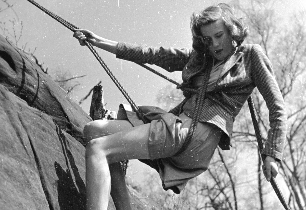 17th August 1946:  A beginner abseiling down Harrisons Rocks, Groombridge, Kent. Original Publication: Picture Post - 4164 - Up The Rocks - pub. 1946  (Photo by Merlyn Severn/Picture Post/Hulton Archive/Getty Images)