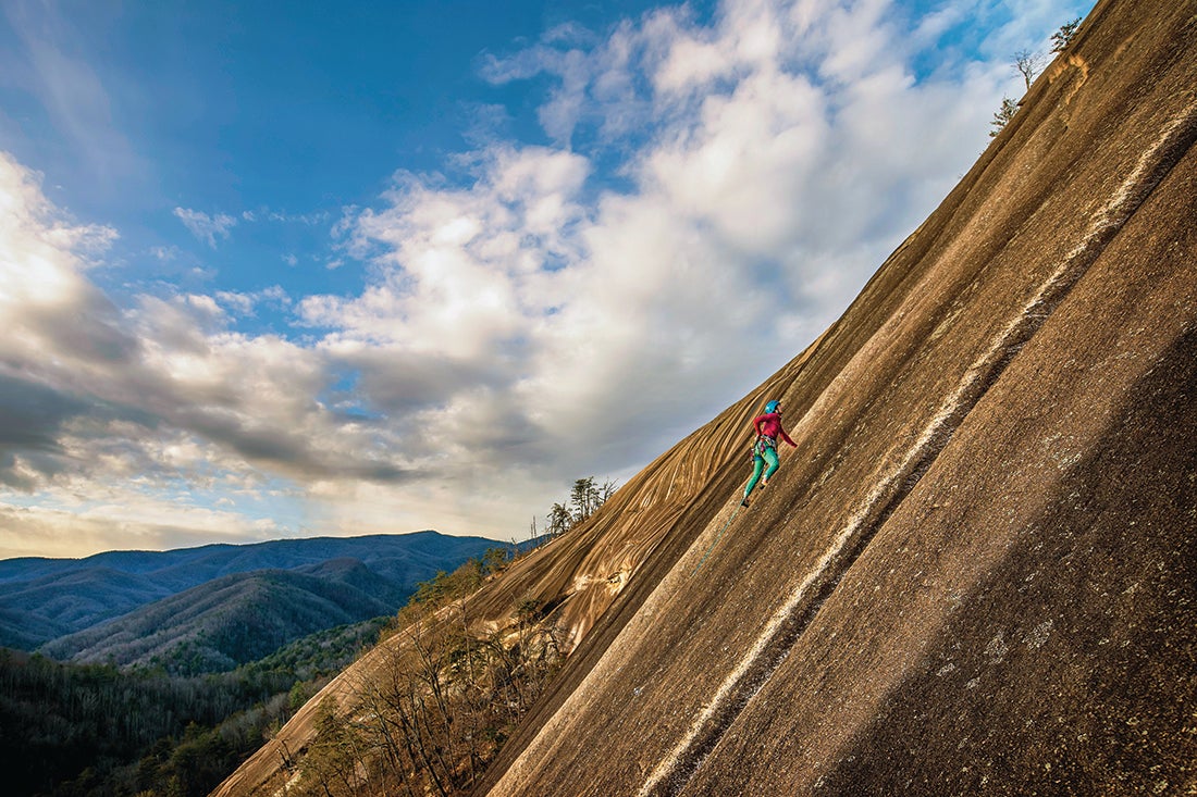Erica Lineberry on the smooth slabs of Great White Way (5.9), Stone Mountain, North Carolina.