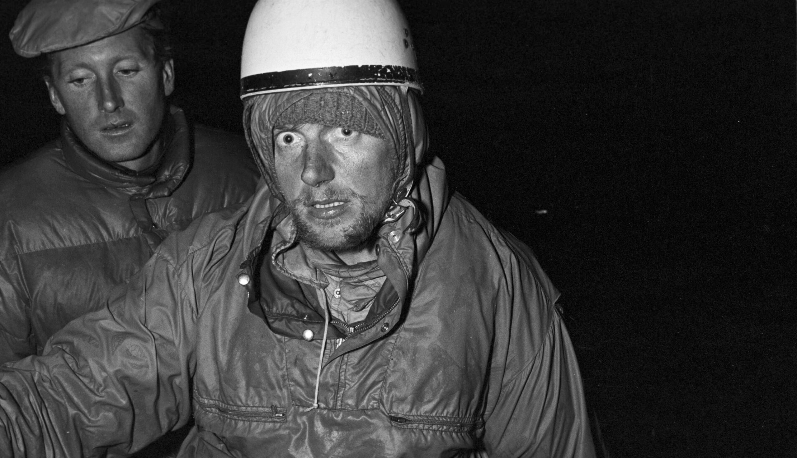 A stunned Hermann Schriddel safely off the Dru, facing the media spectacle. 