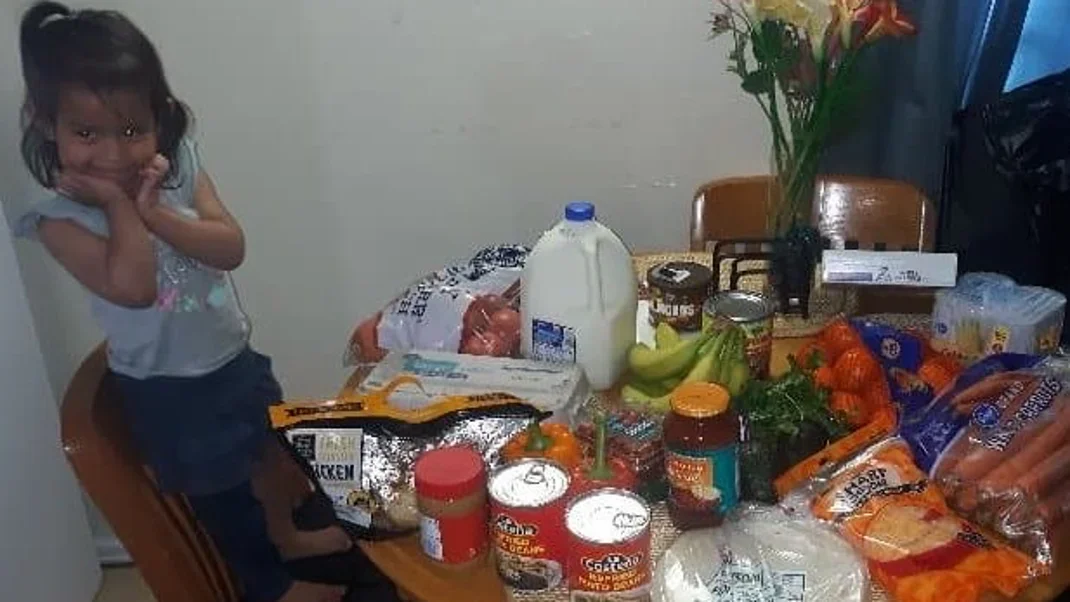 Cristell Alvarez, age 2, a smiling recipient. Photo courtesy Alvarez family.