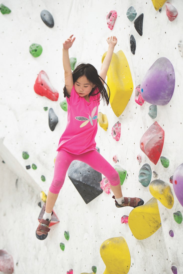 Young climber at 9 Degree Gymnasium in Alexandria, Sydney, Australia.