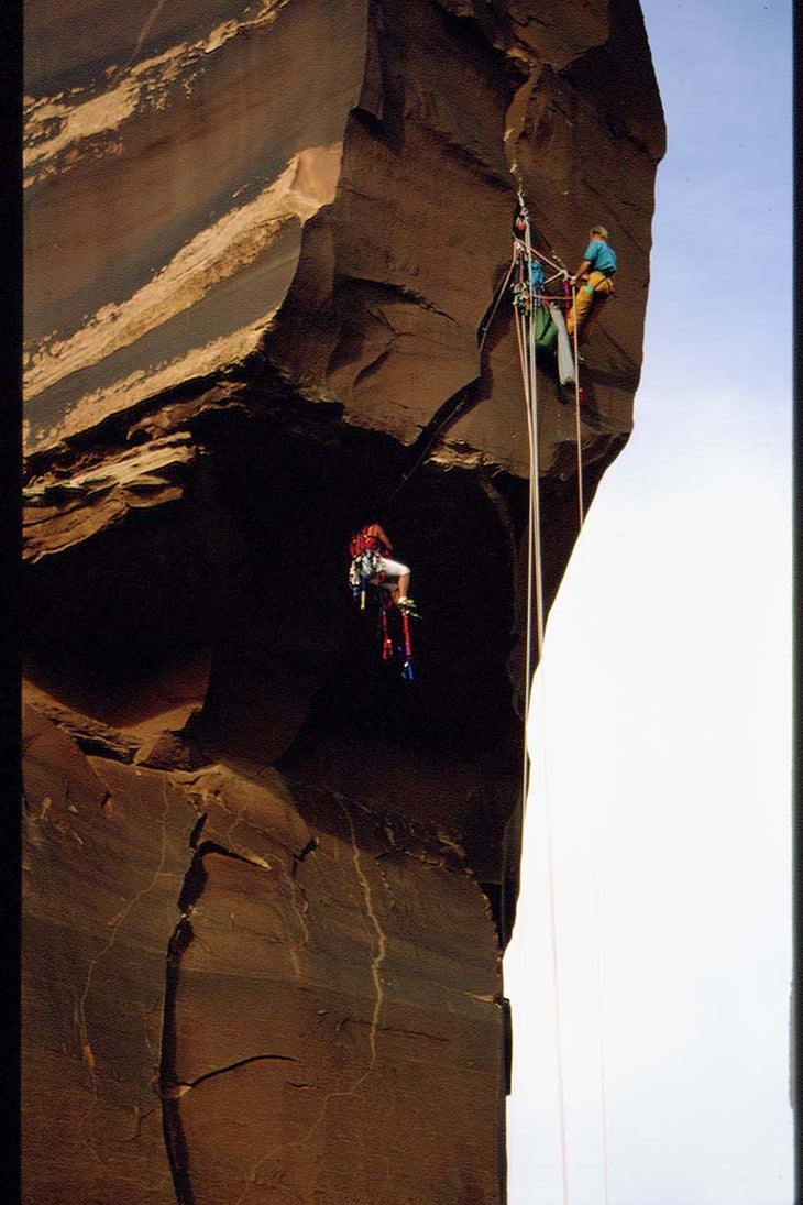 Jeff Lowe and Catherine Destivile climb Moses tower outside Moab, Utah.