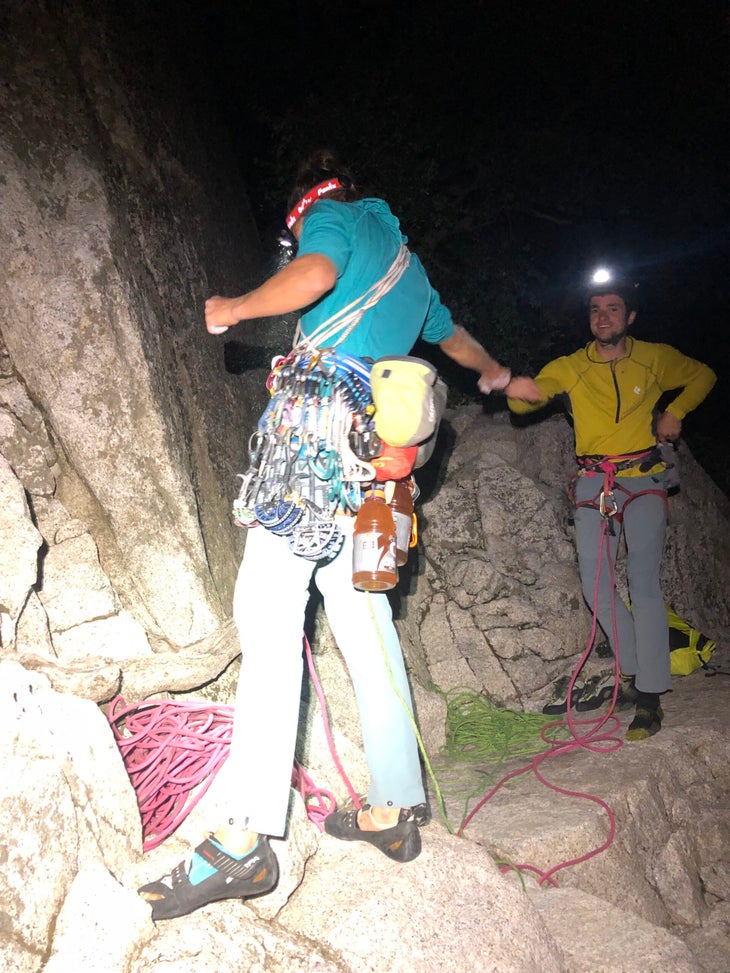 Two climbers start climbing at night on El Capitan.