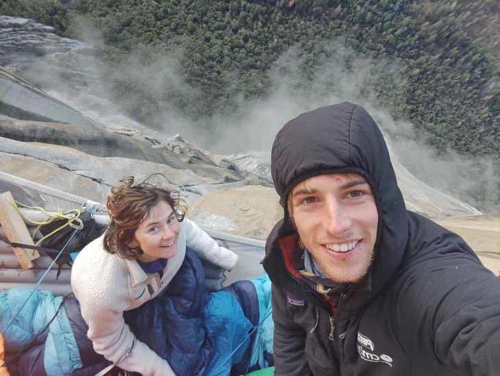 Two climbers sleep in a portaledge on El Capitan, Yosemite.