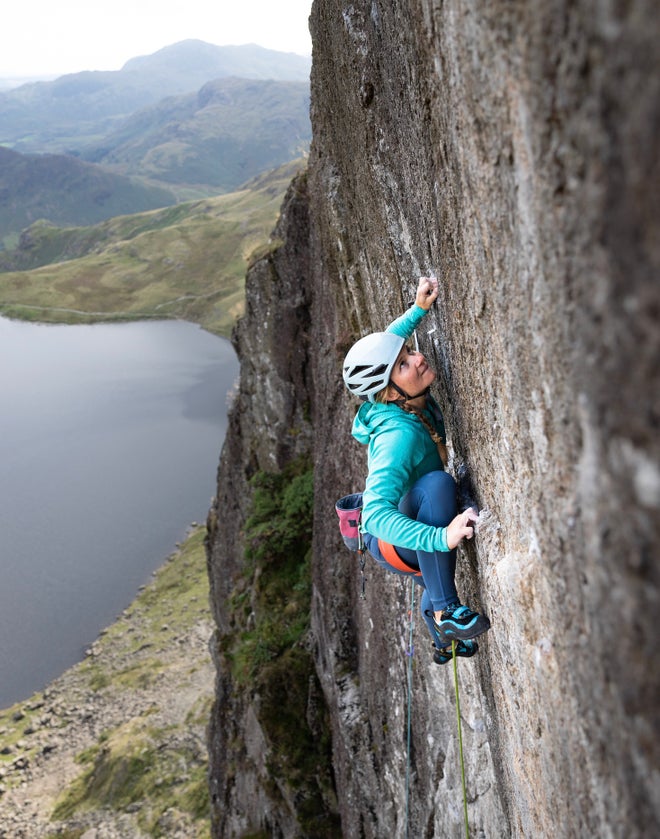 Hazel Findlay climbs steep rock wall in the UK.