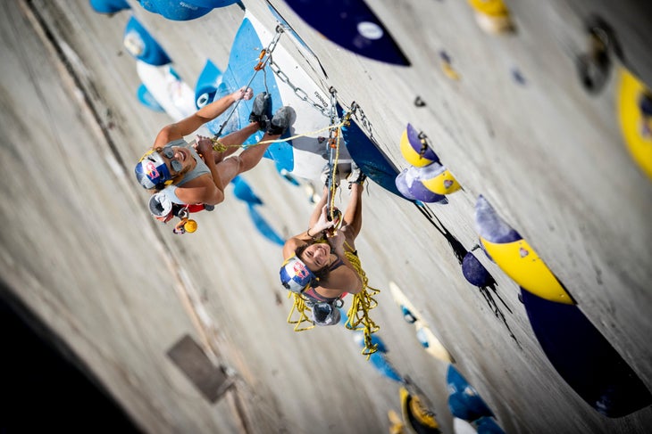 Sasha DiGiulian and Angie Scarth Johnson scope out the route during qualifiers.