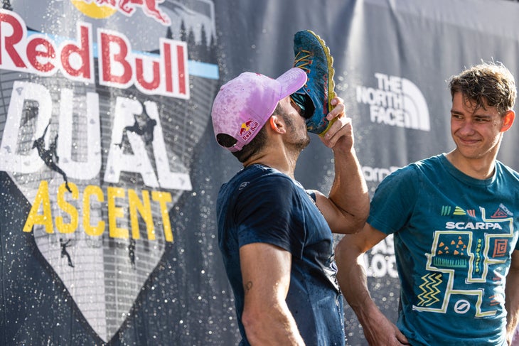 Alberto Ginés López takes a celebratory sip of champagne from his shoe.