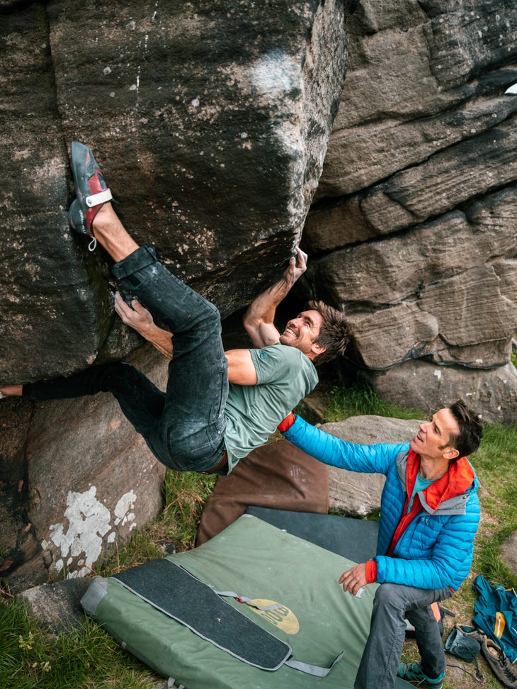Rock climbers Tom Randall and Ollie Torr bouldering in England.