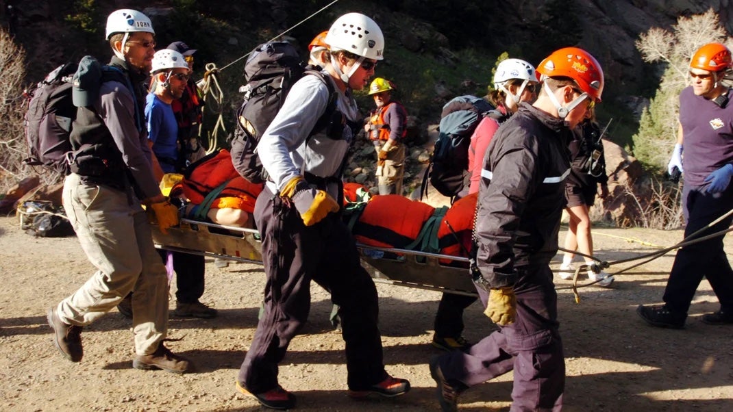 A fall victim is rushed into an ambulance in Colorado's Eldorado Canyon State Park. Rocky Mountain Rescue and the Boulder Emergency Squad worked Sunday afternoon on April 27, 2008 to rescue an injured climber in Eldorado Canyon State Park.