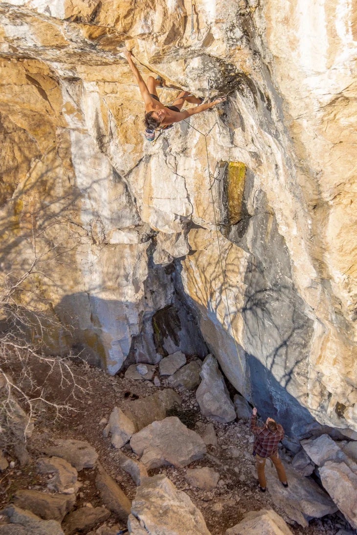 A climber on a hard climbing route in Burlington vermont