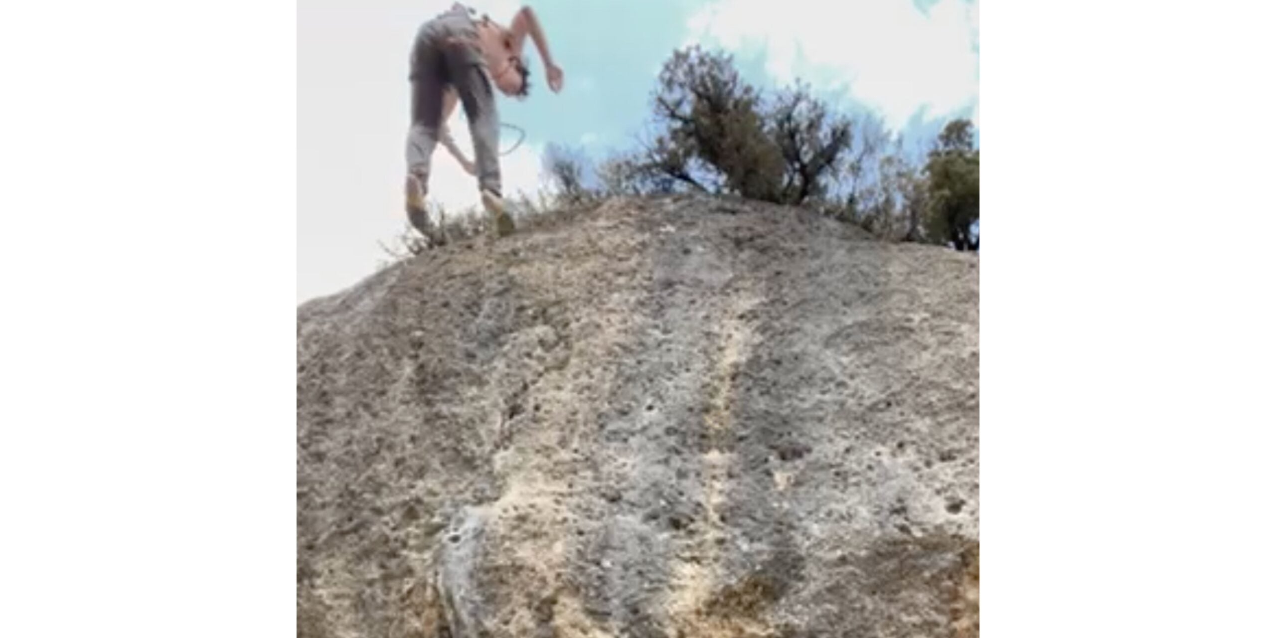 Rock climber falls from cliff with extra slack in hand.