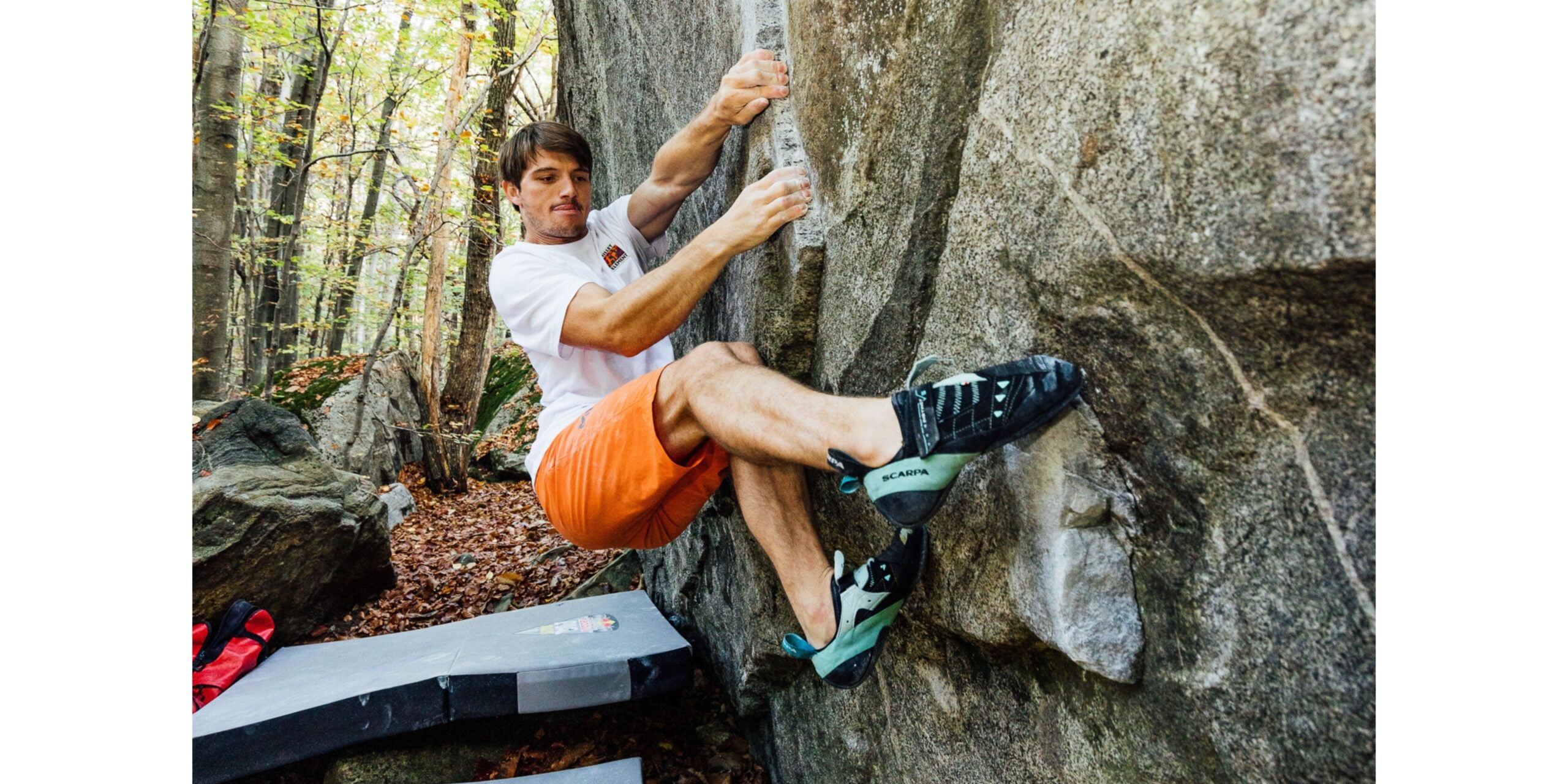 Nills Favre climbs a boulder in Lacarno, Switzerland on October 26th 2022