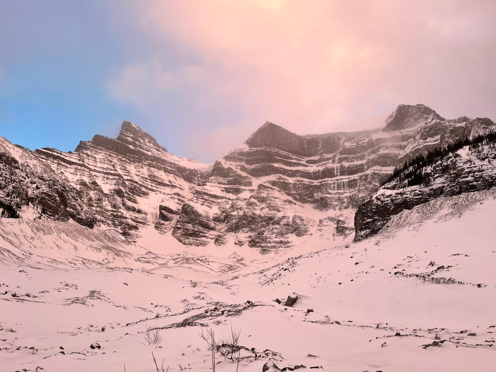 A famous ice climb in Canada, Reality Bath, is pictured at sunrise below a layer of serac ice.