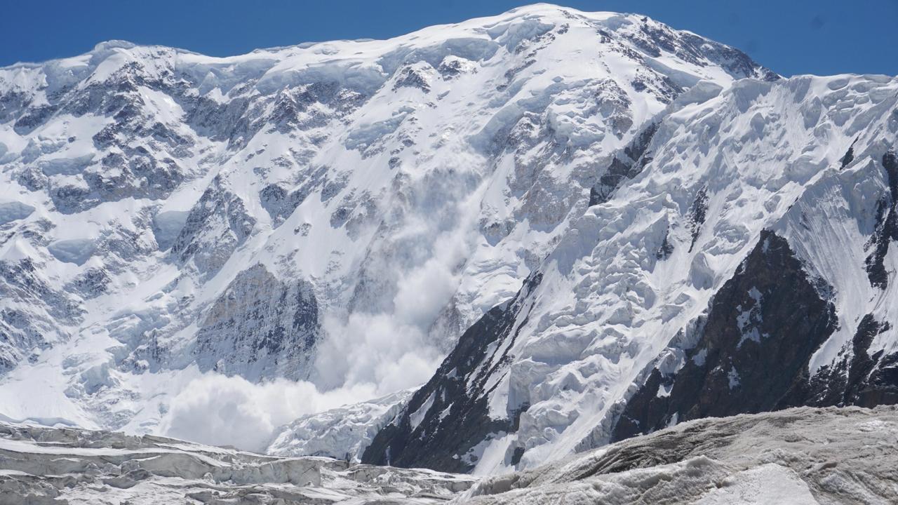A snow covered Pobeda Peak, where four climber fatalities occured this summer.
