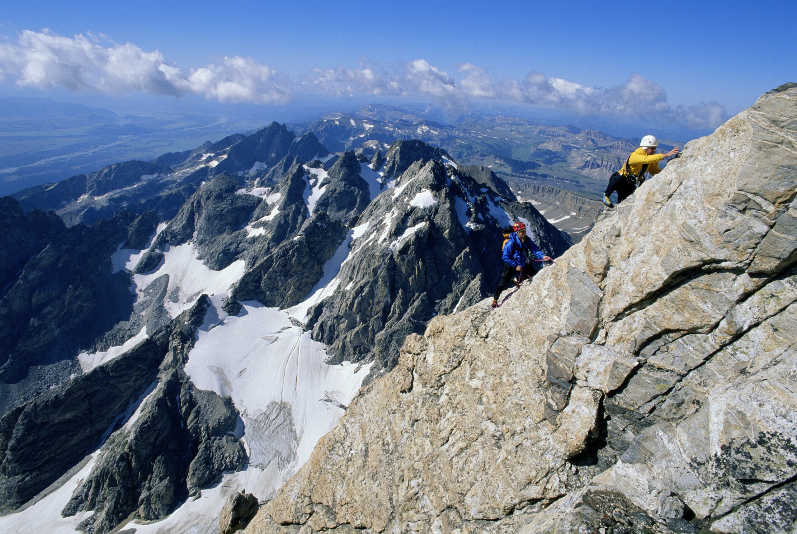 human errors in climbing play a significant role in accidents; climbers ascend a ridge in the grand tetons